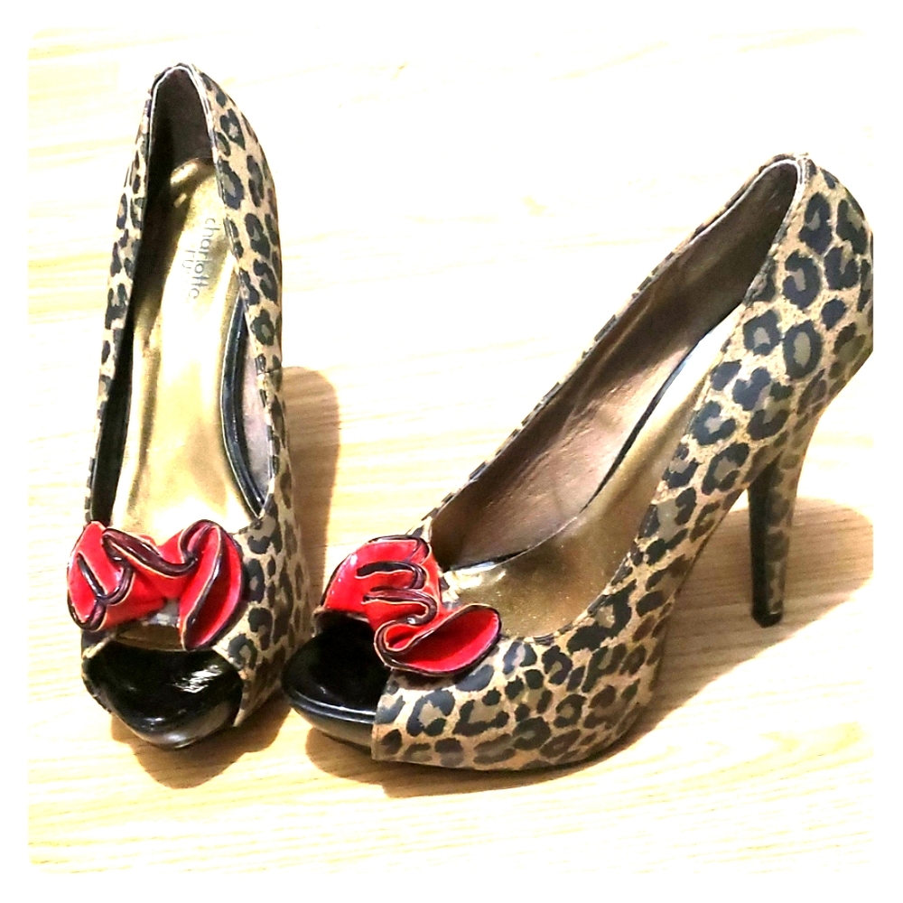 Leopard pumps with red bow accent